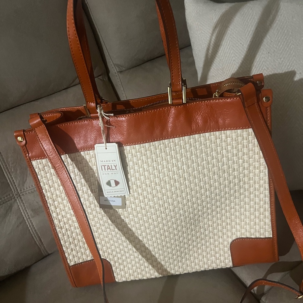 Beautiful and fancy Anna Paola handbag.